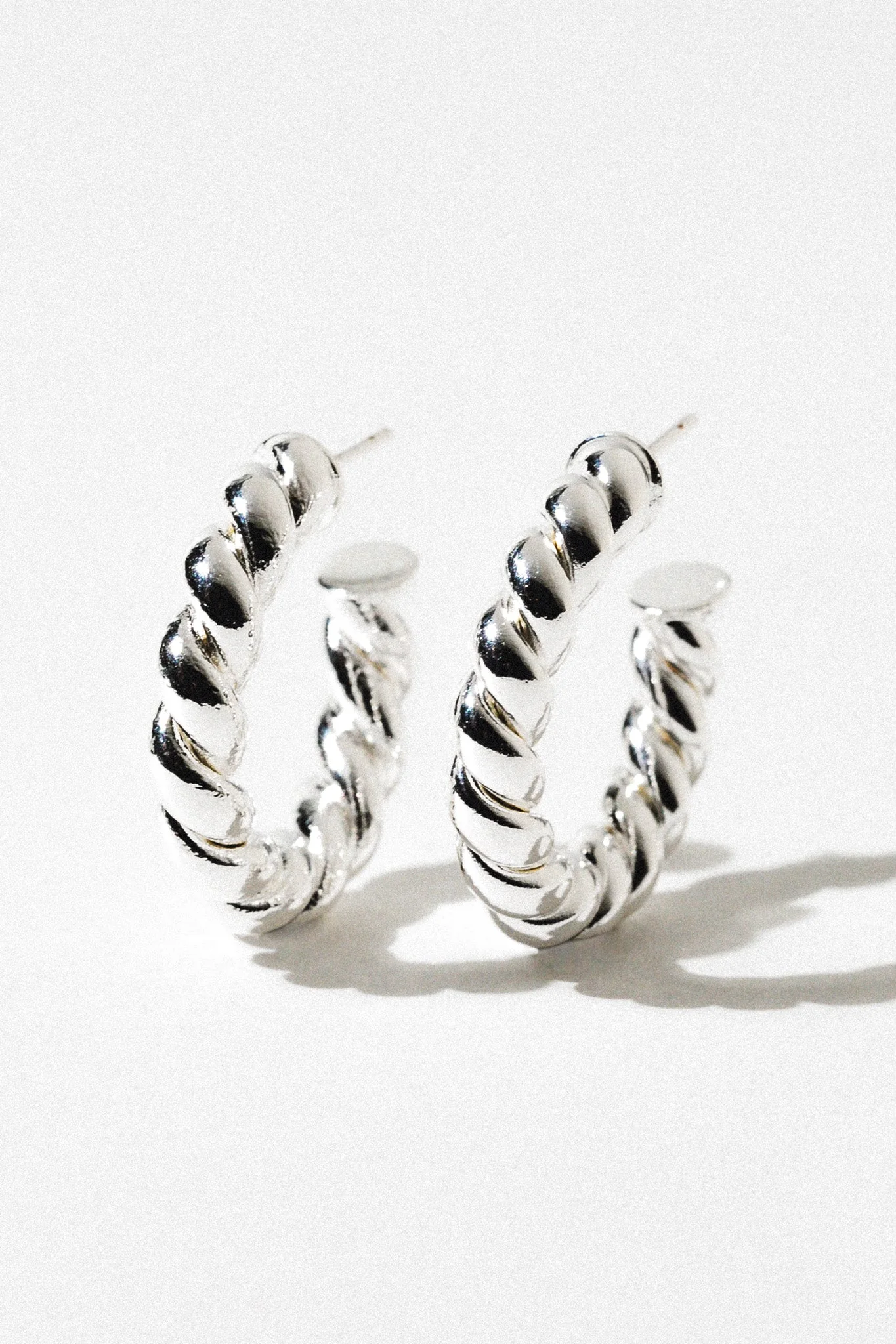 A381E348-0A99-A0BC-5841-EA15E305DE22 Elegant Spiral Hoop Earrings - Image 1